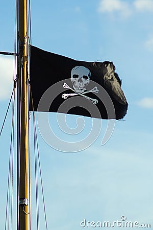 Flag of a Pirate skull and crossbones. Stock Photo