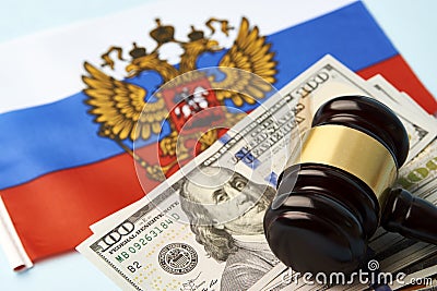 Flag of Russia with US dollar money and Judge gavel Stock Photo
