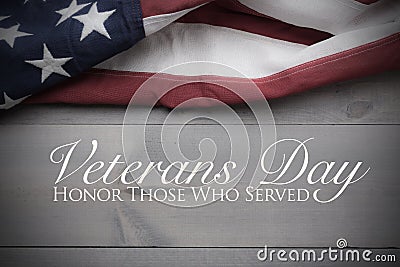 The flag of the United Sates on a grey plank background with copy space Veterans Day tribute Stock Photo