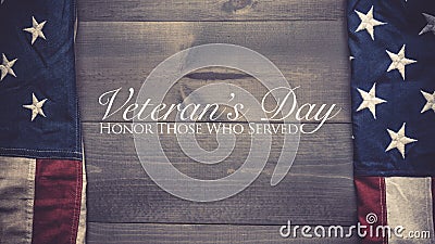 The flag of the United Sates on a grey plank background with copy space Veterans Day tribute Stock Photo