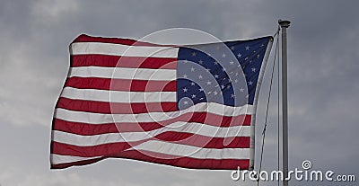 Proudly flying American flag Stock Photo
