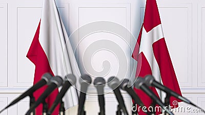 Flaggen von Polen und von Dänemark bei der internationalen Sitzungs- oder VerhandlungsPressekonferenz stock video footage Flaggen von Polen und von Dänemark bei der internationalen Sitzungs- oder VerhandlungsPressekonferenz stock video footage