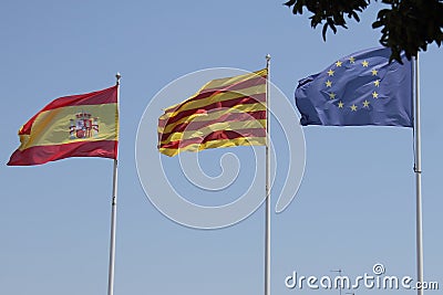 Flags of EU, Spain, Catalunia, Tarragona Editorial Stock Photo