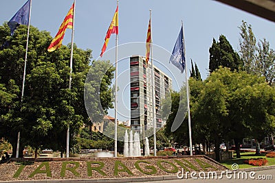 Flags of EU, Spain, Catalunia, Tarragona Editorial Stock Photo