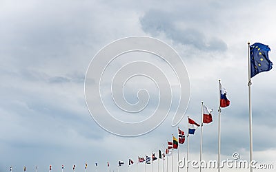 Flags of the European countries fluttering in the sky in Sweden. Representation of the EU countries and their connections with Stock Photo
