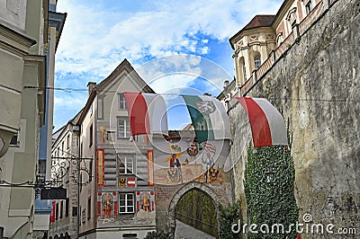 Flags in front of a gate entrance in Castle Lamberg Steyr Stock Photo