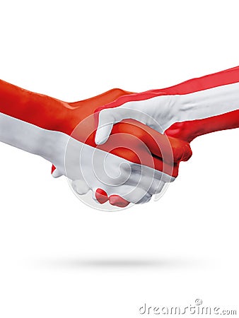 Flags Monaco, Austria countries, partnership friendship handshake concept. Stock Photo