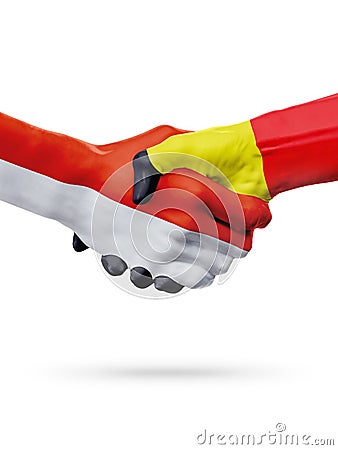 Flags Monaco, Belgium countries, partnership friendship handshake concept. Stock Photo