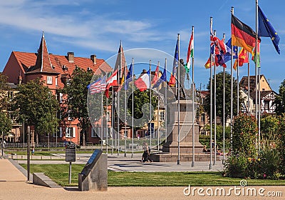 Flags on Place Rapp square in Colmar, France Editorial Stock Photo