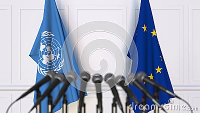 Flags of the United Nations and the European Union at international meeting or conference. Editorial 3D rendering Editorial Stock Photo