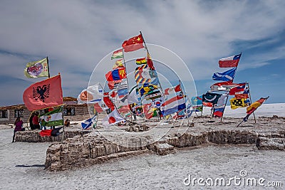 Flags of various nations at Salar de Uyuni Salt Lake, Bolivia Editorial Stock Photo