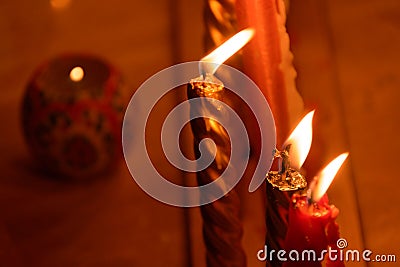 burning candles in the church or night of christmas Stock Photo