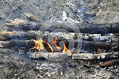 The flame of the fire goes out against Stock Photo