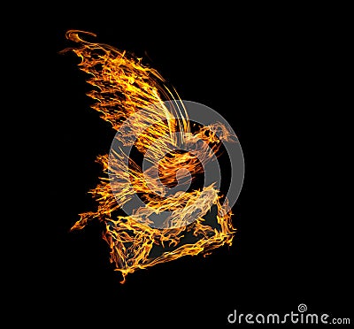 Flame flying dove with envelope isolated on black Stock Photo
