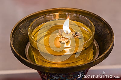 Flame from oil lamps is the symbol of Buddhism Stock Photo