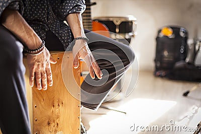 Flamenco drumbox being played by percussionist. Stock Photo