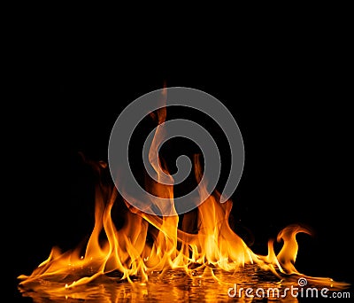 Flames reflected in water Stock Photo