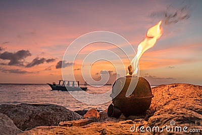 Flames in the Sunset at the coast Curacao Views Stock Photo