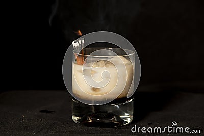 Flaming Cinnamon cocktail with kahlua, baileys irish cream and sambuca Stock Photo