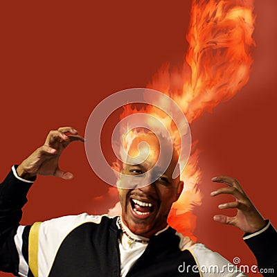 Flaming Head with Orange Smoke Stock Photo