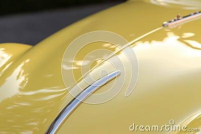 A flaming orange production racer closeup of its grills and curved quarter panels. Speed drive concept. AI generation Stock Photo