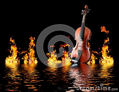 Flaming violin Stock Photo