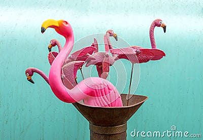 Flamingo Yard-Spinners Against Turquoise Blue Background Editorial Stock Photo