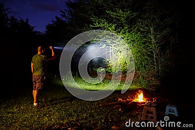 Flashlight in outdoor camping Stock Photo