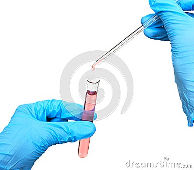 Flask in scientist hand with dropping chemical liquid to test tubes, science and medical research Stock Photo