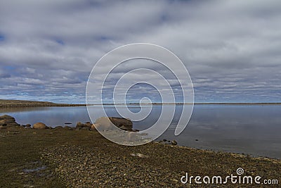 Flat arctic landscape and lake Stock Photo
