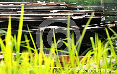 Flat boats on the backwater in summer Stock Photo