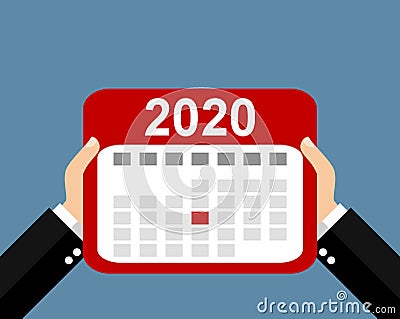Two hands holding calendar showing appointments and events in 2020 Stock Photo