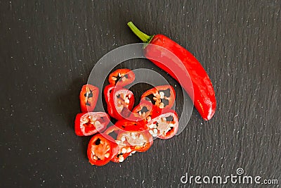 Flat lay of chopped chili on dark background Stock Photo