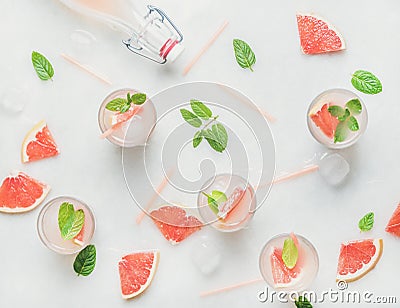 Flat-lay of cold refreshing summer alcohol cocktail with fresh grapefruit Stock Photo