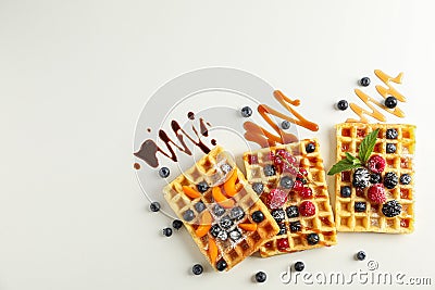 Flat lay composition with belgian waffles and different toppings Stock Photo