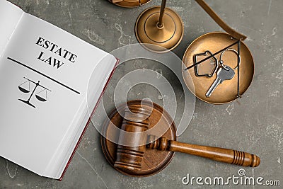 Flat lay composition with book, gavel, house key Stock Photo