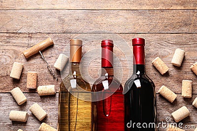 Flat lay composition with bottles of wine and corks on Stock Photo