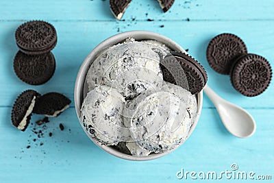 Flat lay composition with bowl of ice cream and crumbled chocolate cookies Stock Photo