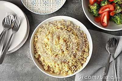 Flat lay composition with cooked quinoa in plate Stock Photo