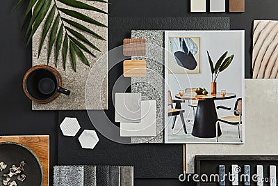 Flat lay composition of creative black architect moodboard with samples of building, textile and natural materials and personal. Stock Photo