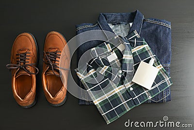 Flat lay composition with denim jacket, shirt, perfume and shoes Stock Photo