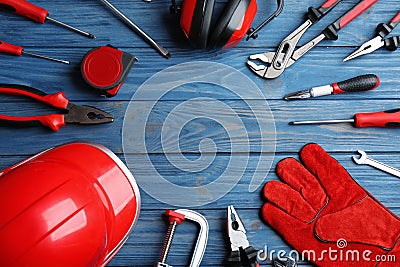 Flat lay composition with different construction tools and space for text on color background Stock Photo