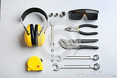 Flat lay composition with different construction tools on white Stock Photo