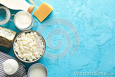 Flat lay composition. Different dairy products on blue background Stock Photo