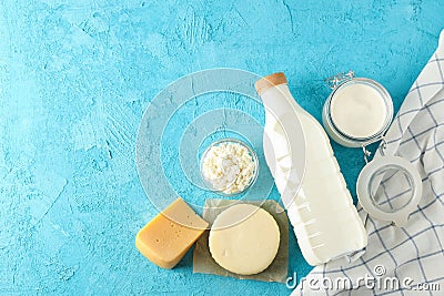 Flat lay composition. Different dairy products on blue background Stock Photo