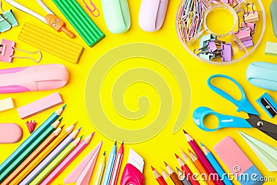 Flat lay composition with different school stationery on yellow background, space for text. Back to school Stock Photo