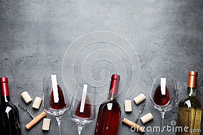 Flat lay composition with different wines on grey background Stock Photo