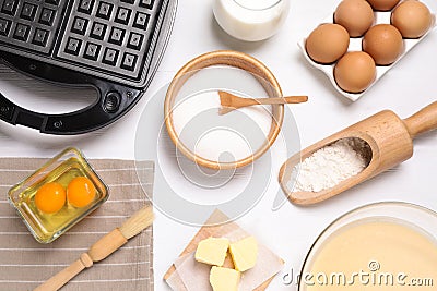 Flat lay composition with ingredients for cooking Belgian waffles on white table Stock Photo