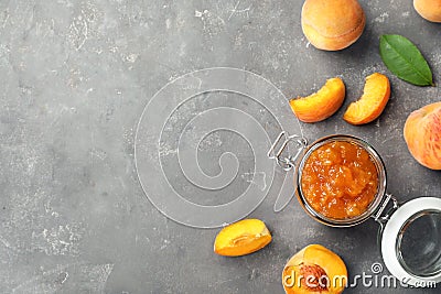 Flat lay composition with jar of tasty peach jam and fresh fruit Stock Photo