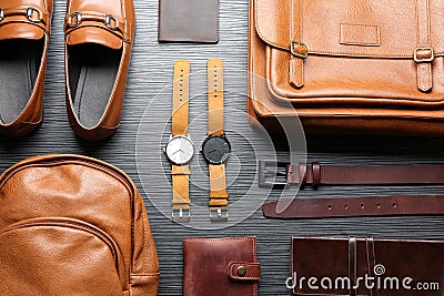 Flat lay composition with leather bags, shoes and accessories on wooden table Stock Photo